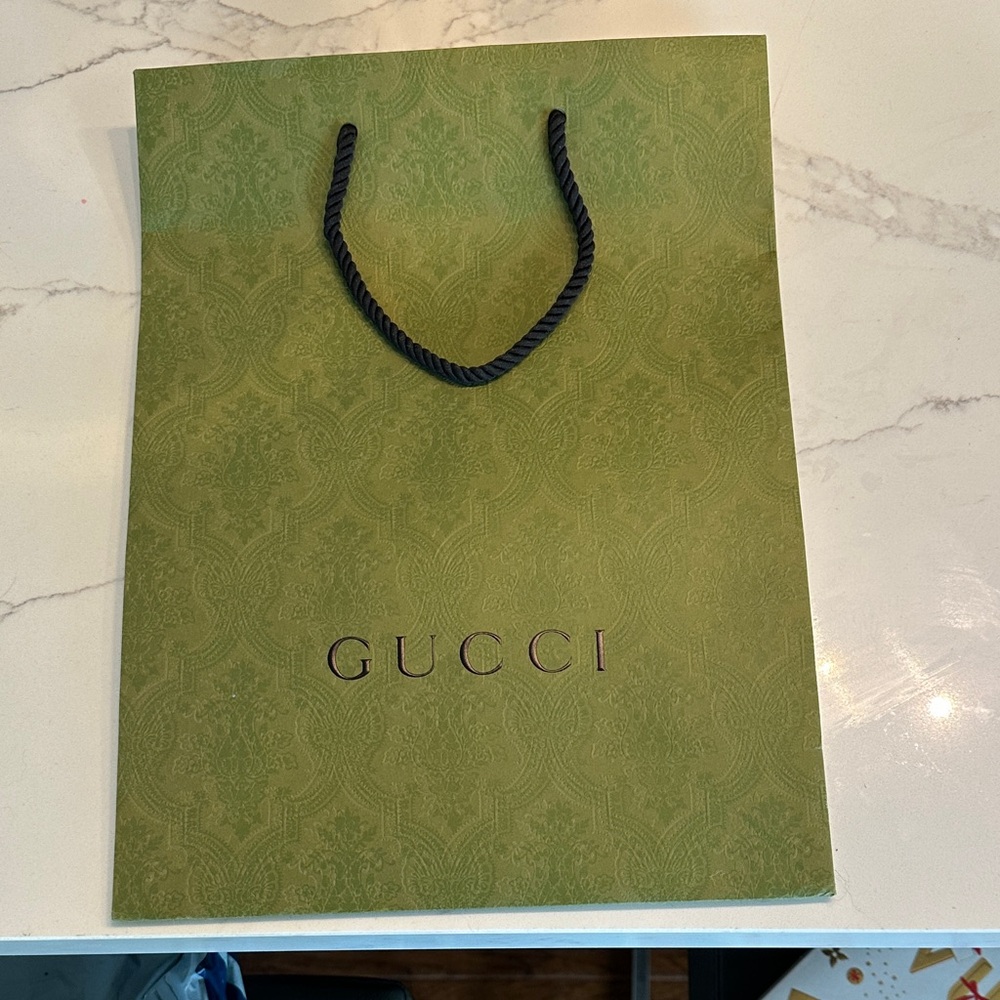 Empty Gucci shopping bag